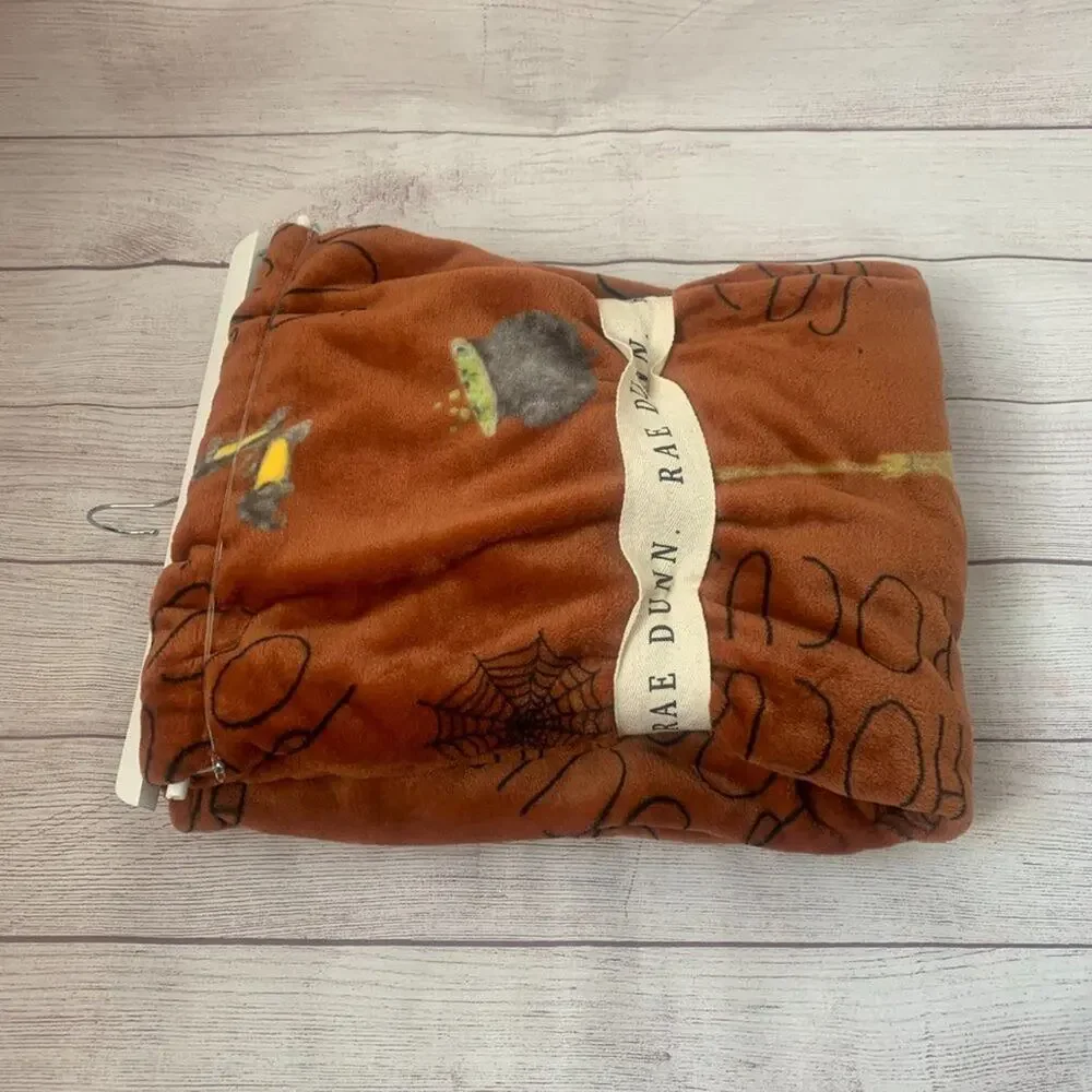 Rae Dunn Hocus Pocus Blanket Orange with Cauldron Broom Witch Hat Shoes 50x70
